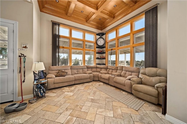 35655 52nd St E, Palmdale, CA 93552 - living room featuring a wooden ceiling with exposed beams, recessed lighting, coffered ceiling, healthy amount of natural light, and crown molding