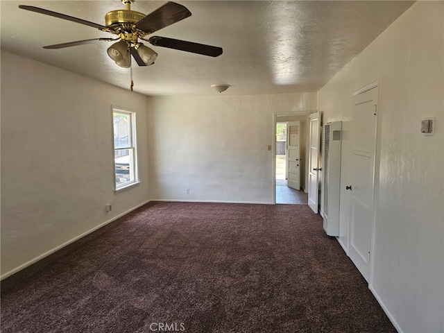 26483 9th St, Highland, CA 92346 - spare room featuring a heating unit, healthy amount of natural light, carpet, and ceiling fan
