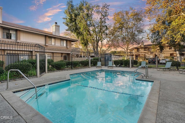 4448 Lubbock Dr Unit C, Simi Valley, CA 93063 - pool at dusk featuring a community pool