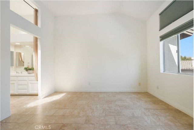 5527 Patricia Way, Yorba Linda, CA 92887 - spare room with stone finish floors and high vaulted ceiling