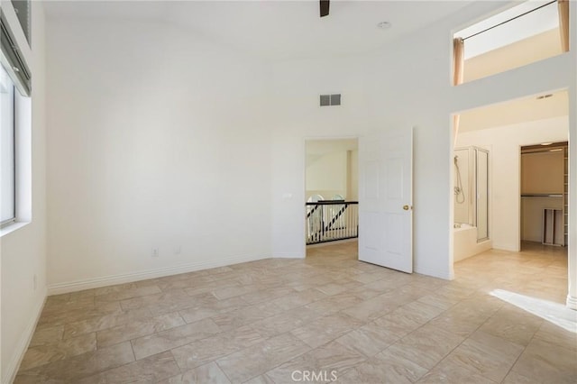 5527 Patricia Way, Yorba Linda, CA 92887 - spare room with high vaulted ceiling and baseboards