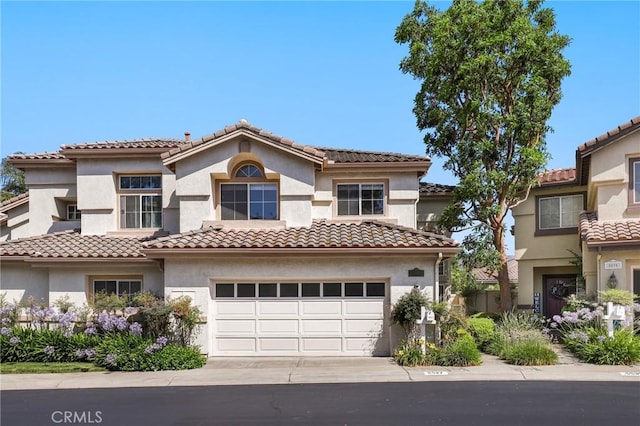5527 Patricia Way, Yorba Linda, CA 92887 - mediterranean / spanish home featuring concrete driveway, stucco siding, and a garage
