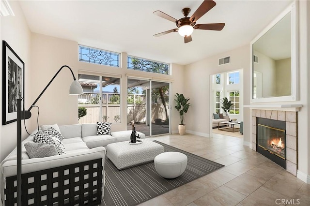 5527 Patricia Way, Yorba Linda, CA 92887 - tiled living area with plenty of natural light, a ceiling fan, and a tile fireplace