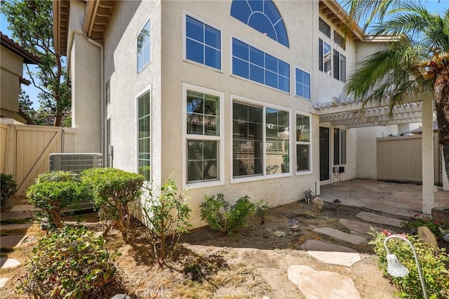 5527 Patricia Way, Yorba Linda, CA 92887 - view of home's exterior with stucco siding, a pergola, and a patio area