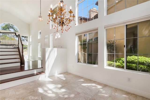 5527 Patricia Way, Yorba Linda, CA 92887 - unfurnished dining area featuring stairs, a chandelier, and high vaulted ceiling