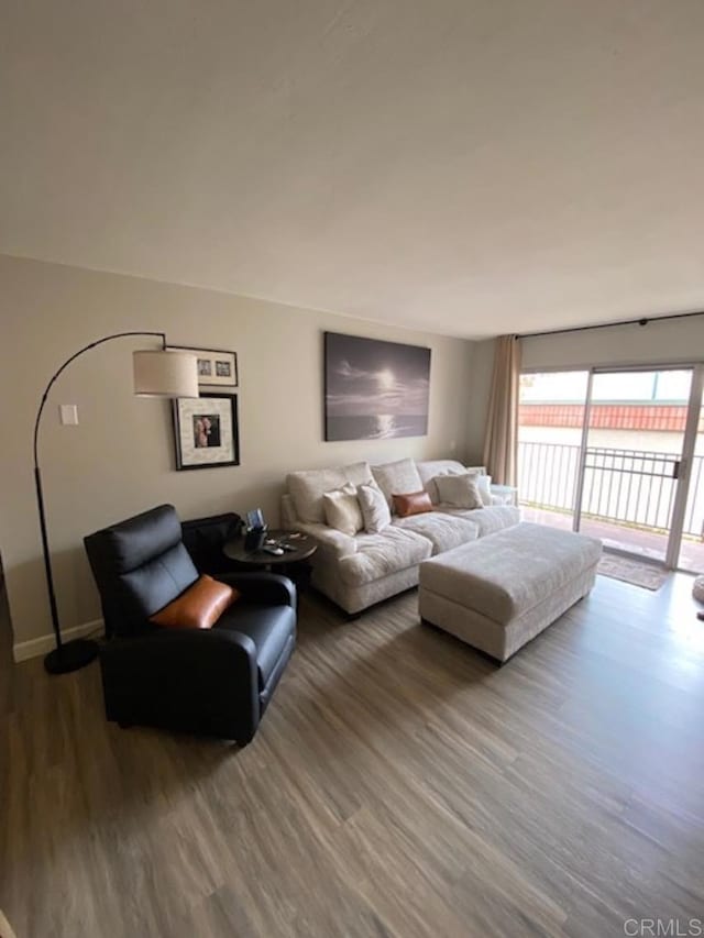 2330 Hosp Way Unit 303, Carlsbad, CA 92008 - living area with wood finished floors and a water view