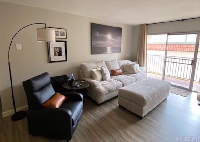 2330 Hosp Way Unit 303, Carlsbad, CA 92008 - living area featuring wood finished floors and baseboards