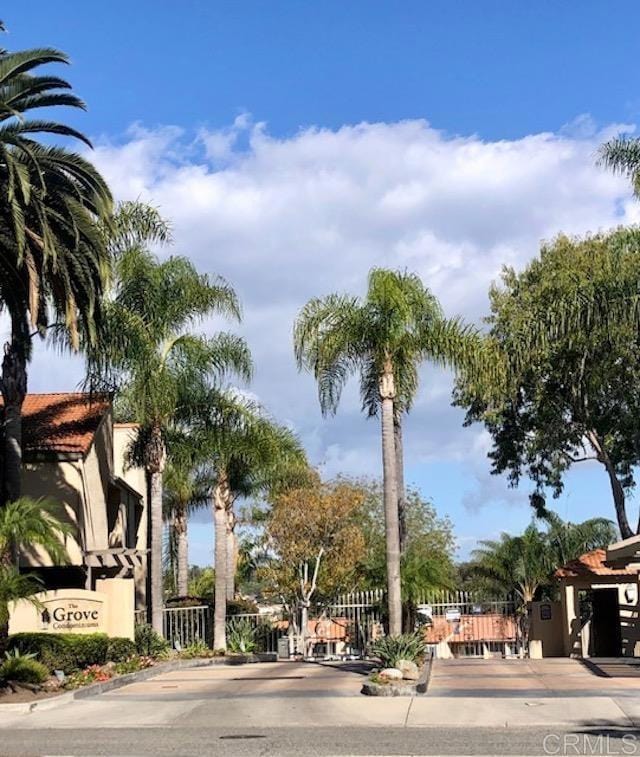 2330 Hosp Way Unit 303, Carlsbad, CA 92008 - view of asphalt street with a gated entry and curbs