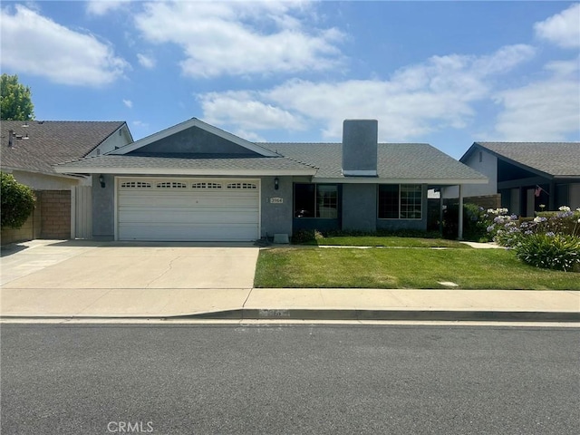 3964 Hibbert Ct, Simi Valley, CA 93063 - ranch-style home with a garage, driveway, a front yard, and stucco siding