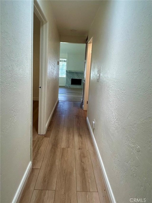 3964 Hibbert Ct, Simi Valley, CA 93063 - hallway featuring hardwood / wood-style floors and a textured wall