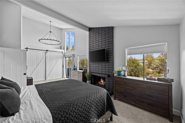 23414 Highcrest Rd, Dana Point, CA 92629 - bedroom with light carpet, a barn door, a chandelier, high vaulted ceiling, and beam ceiling