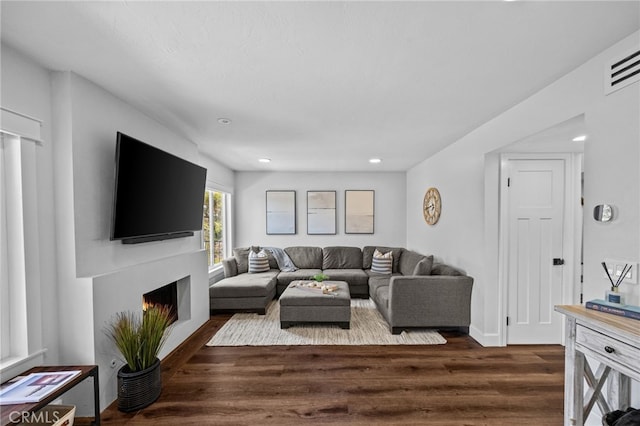 23414 Highcrest Rd, Dana Point, CA 92629 - living area featuring dark wood-style flooring, a lit fireplace, and recessed lighting
