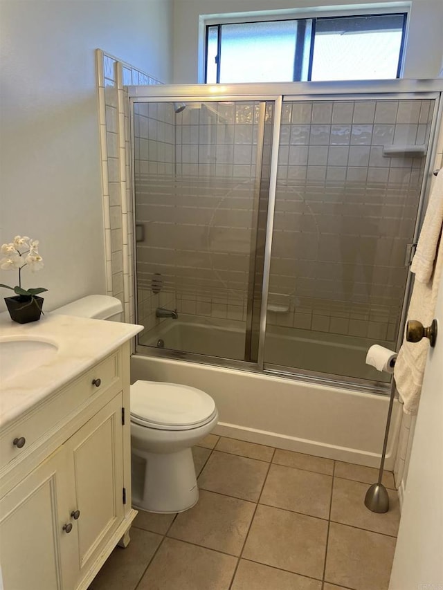 1404 Lombard St, Vista, CA 92084 - full bathroom with tile patterned flooring, vanity, and enclosed tub / shower combo