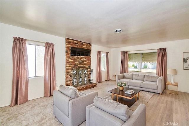 30 N Vega St, Alhambra, CA 91801 - living area featuring plenty of natural light and a brick fireplace