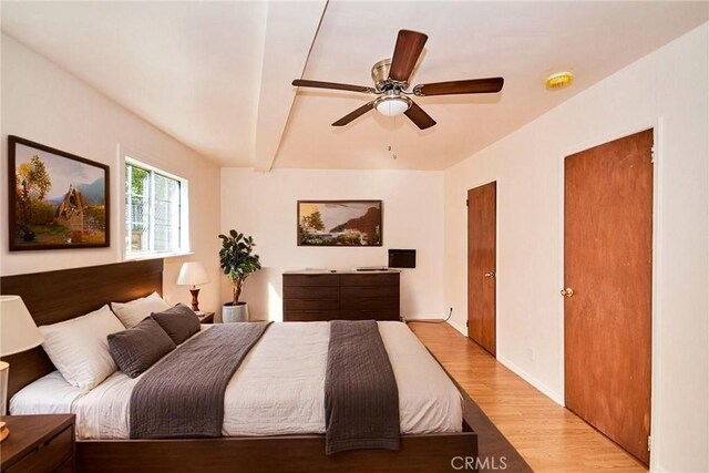 30 N Vega St, Alhambra, CA 91801 - bedroom with light wood-type flooring, beamed ceiling, and a ceiling fan