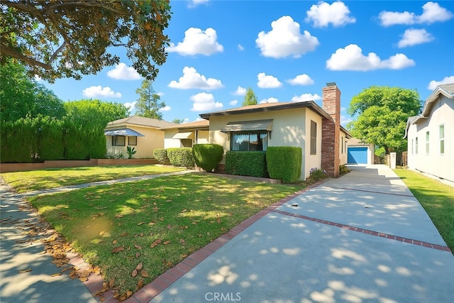 30 N Vega St, Alhambra, CA 91801 - view of front of home with stucco siding, a chimney, a front yard, and a garage