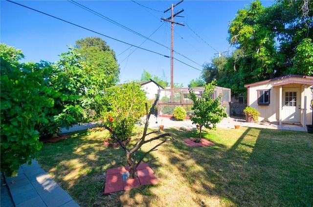 30 N Vega St, Alhambra, CA 91801 - view of green lawn with an outbuilding