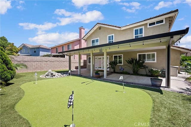 19177 White Dove Ln, Riverside, CA 92508 - back of house with a putting area, a patio, french doors, and stucco siding