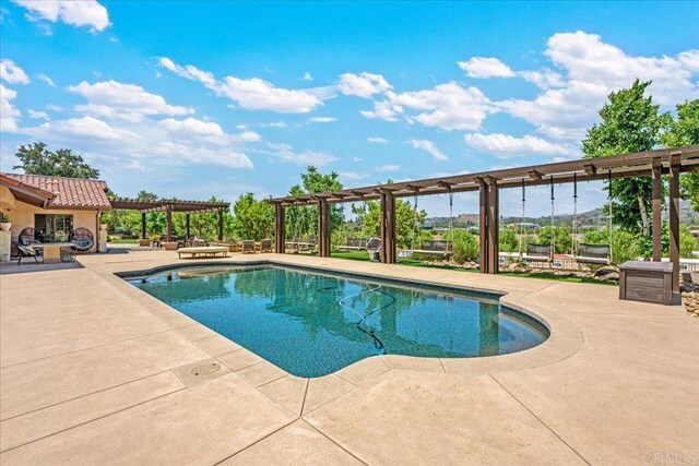 1935 Granite Hills Dr, El Cajon, CA 92019 - outdoor pool with a pergola and a patio