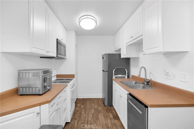 382 S Miraleste Dr Unit 450, San Pedro, CA 90732 - kitchen featuring appliances with stainless steel finishes, white cabinets, dark wood-style floors, and light countertops