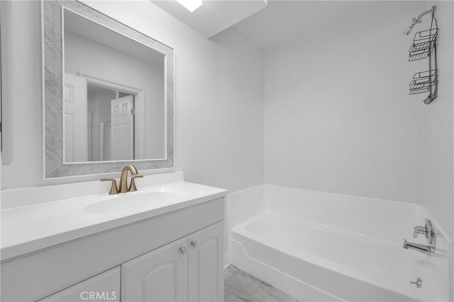 382 S Miraleste Dr Unit 450, San Pedro, CA 90732 - bathroom featuring a bath, vanity, and marble finish flooring