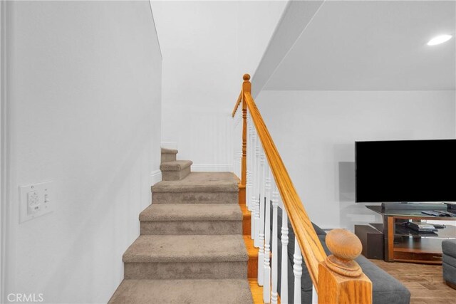 382 S Miraleste Dr Unit 450, San Pedro, CA 90732 - staircase with wood finished floors and recessed lighting