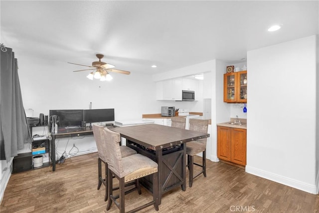 382 S Miraleste Dr Unit 450, San Pedro, CA 90732 - dining room with wood finished floors, a ceiling fan, recessed lighting, and an office area
