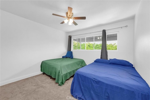 382 S Miraleste Dr Unit 450, San Pedro, CA 90732 - carpeted bedroom featuring baseboards and a ceiling fan
