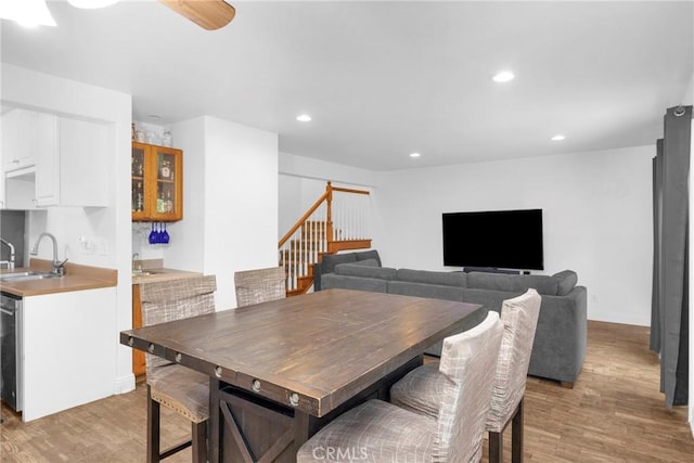 382 S Miraleste Dr Unit 450, San Pedro, CA 90732 - dining room with light wood-style floors, stairway, recessed lighting, and a ceiling fan