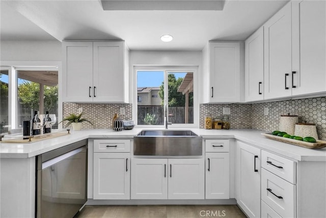 1251 Mayfair Dr, Corona, CA 92882 - kitchen with dishwasher, healthy amount of natural light, light countertops, and recessed lighting