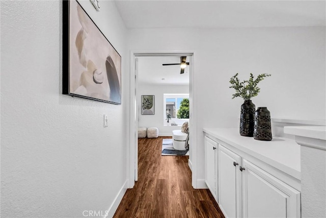 1251 Mayfair Dr, Corona, CA 92882 - corridor with dark wood finished floors and baseboards