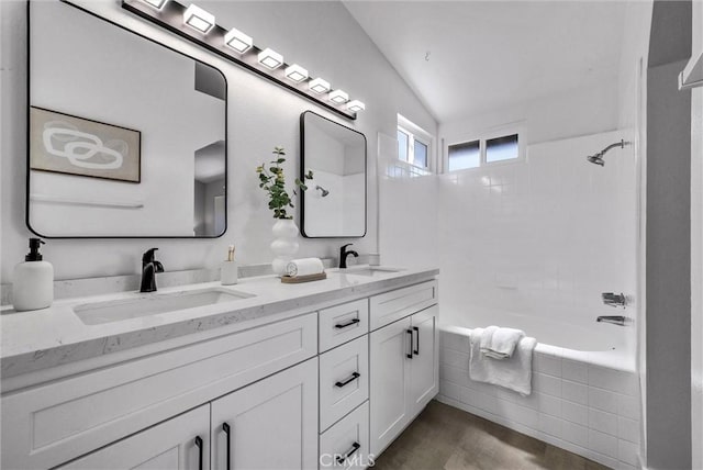 1251 Mayfair Dr, Corona, CA 92882 - full bath featuring double vanity, tiled shower / bath combo, and lofted ceiling