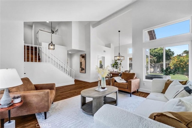 1251 Mayfair Dr, Corona, CA 92882 - living room featuring stairs, high vaulted ceiling, and wood finished floors