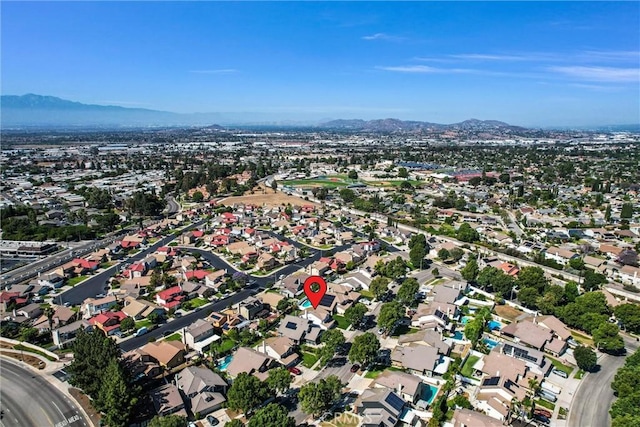 1251 Mayfair Dr, Corona, CA 92882 - aerial view of property and surrounding area featuring mountains and nearby suburban area