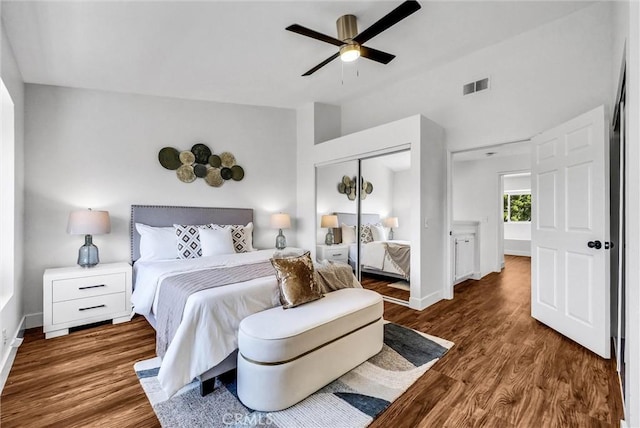 1251 Mayfair Dr, Corona, CA 92882 - bedroom featuring a closet, vaulted ceiling, wood finished floors, and ceiling fan