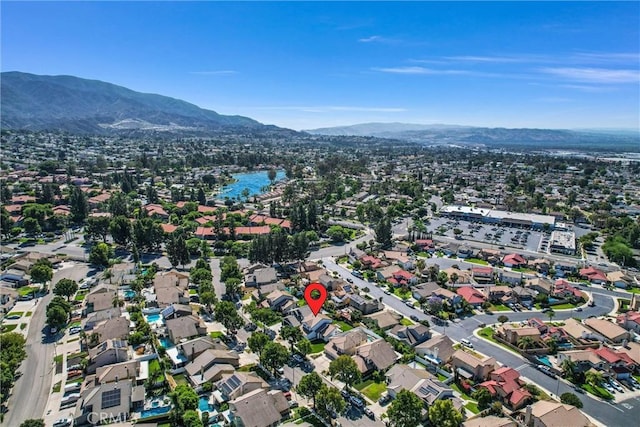1251 Mayfair Dr, Corona, CA 92882 - aerial overview of property's location with a mountain backdrop and nearby suburban area