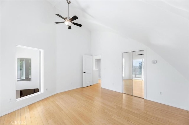 22870 Trigger St, Chatsworth, CA 91311 - unfurnished bedroom with light wood finished floors, high vaulted ceiling, ensuite bathroom, and ceiling fan