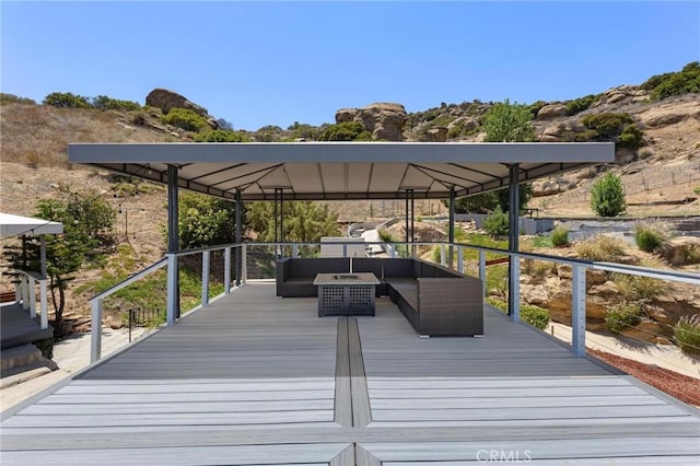 22870 Trigger St, Chatsworth, CA 91311 - wooden terrace featuring outdoor lounge area and a gazebo