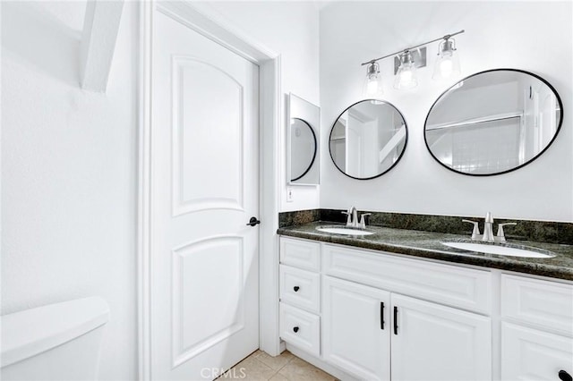 22870 Trigger St, Chatsworth, CA 91311 - full bath featuring double vanity and tile patterned floors