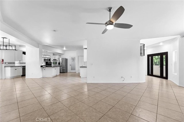 22870 Trigger St, Chatsworth, CA 91311 - unfurnished living room with light tile patterned flooring and a ceiling fan