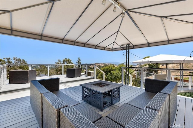 22870 Trigger St, Chatsworth, CA 91311 - deck with an outdoor living space with a fire pit