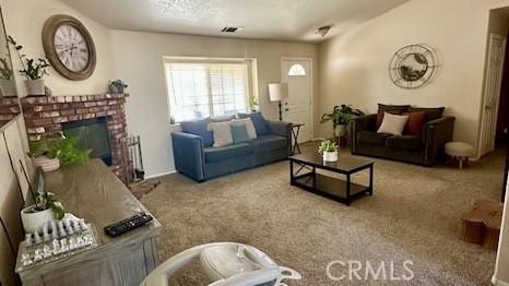 13133 4th Ave, Victorville, CA 92395 - carpeted living room featuring a brick fireplace