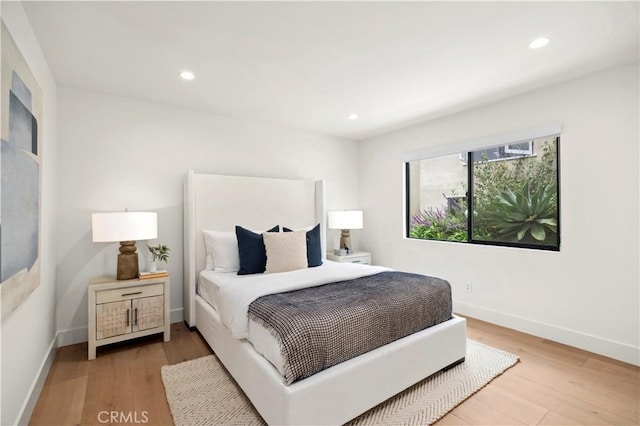 246 Fairview St, Laguna Beach, CA 92651 - bedroom with wood finished floors and recessed lighting