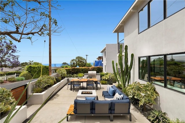 246 Fairview St, Laguna Beach, CA 92651 - view of patio / terrace featuring an outdoor living space with a fire pit and outdoor dining space