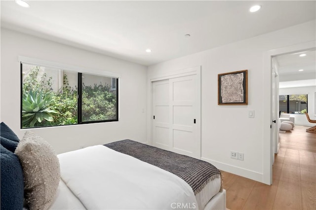 246 Fairview St, Laguna Beach, CA 92651 - bedroom with recessed lighting, light wood-style floors, and a closet