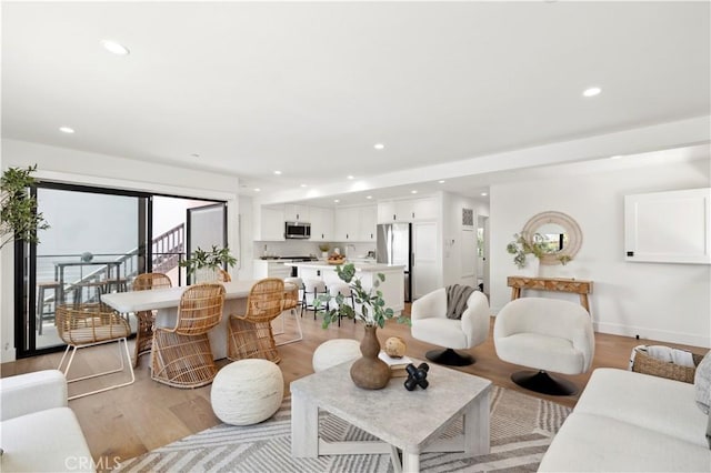 246 Fairview St, Laguna Beach, CA 92651 - living room with light wood-type flooring and recessed lighting