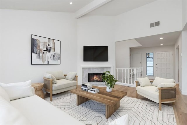 24616 Polaris Dr Unit 272, Dana Point, CA 92629 - living area featuring light wood finished floors, a lit fireplace, and recessed lighting