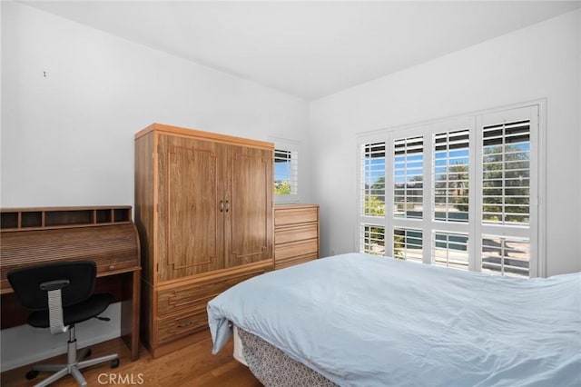 2600 Newport Blvd Unit 219, Newport Beach, CA 92663 - bedroom with wood finished floors and an office area