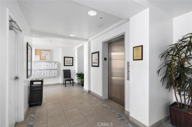2600 Newport Blvd Unit 219, Newport Beach, CA 92663 - hallway featuring elevator and recessed lighting