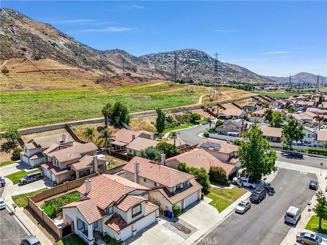 16737 Windcrest Dr, Fontana, CA 92337 - aerial perspective of suburban area featuring a mountain backdrop